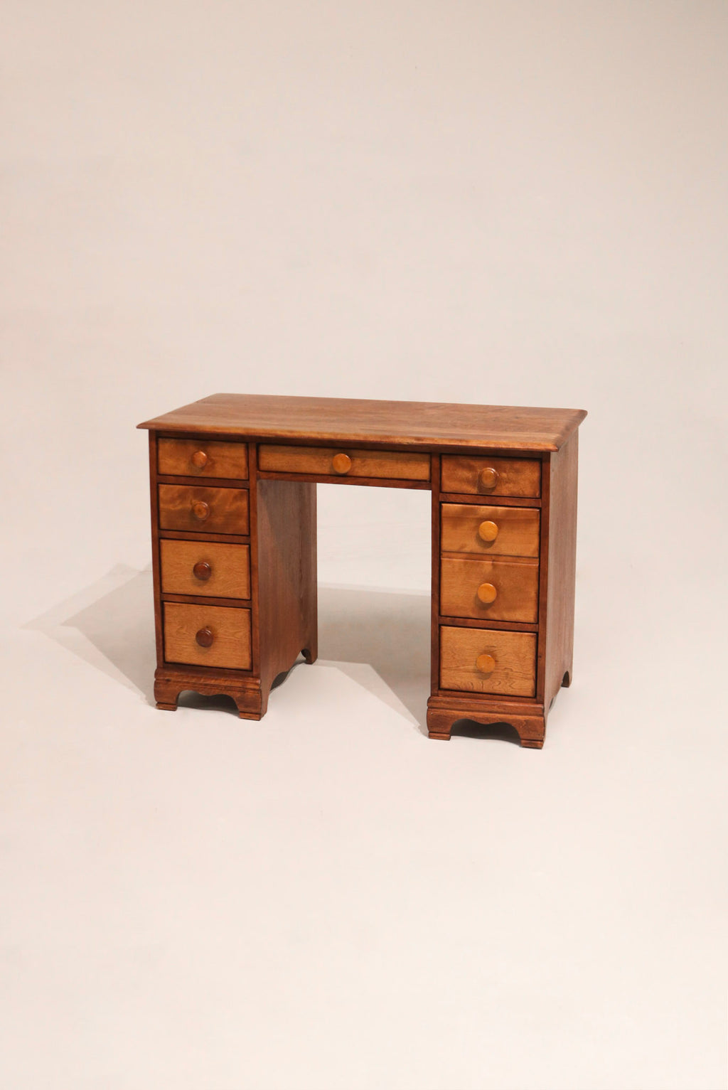 Full view of vintage solid maple wood desk with drawers made in Vermont, 1950s design