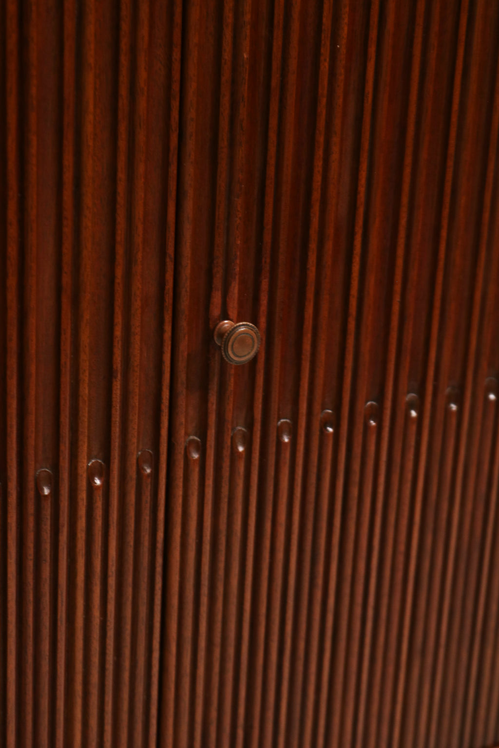 Detail of top drawer showing polished walnut wood and clean construction with smooth edges