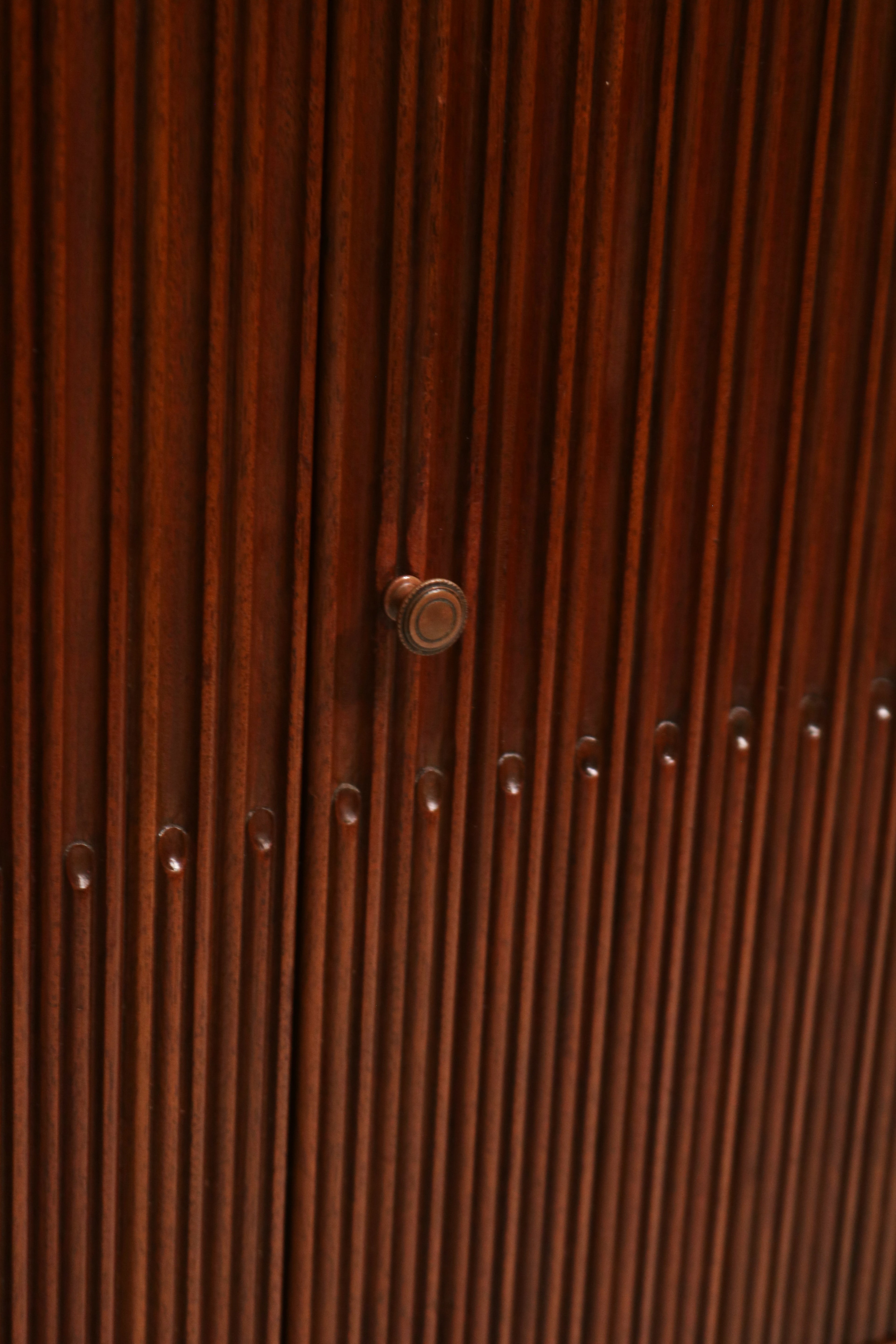 Detail of top drawer showing polished walnut wood and clean construction with smooth edges