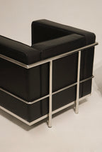 Close-up of black faux leather backrest with clean lines and contemporary design