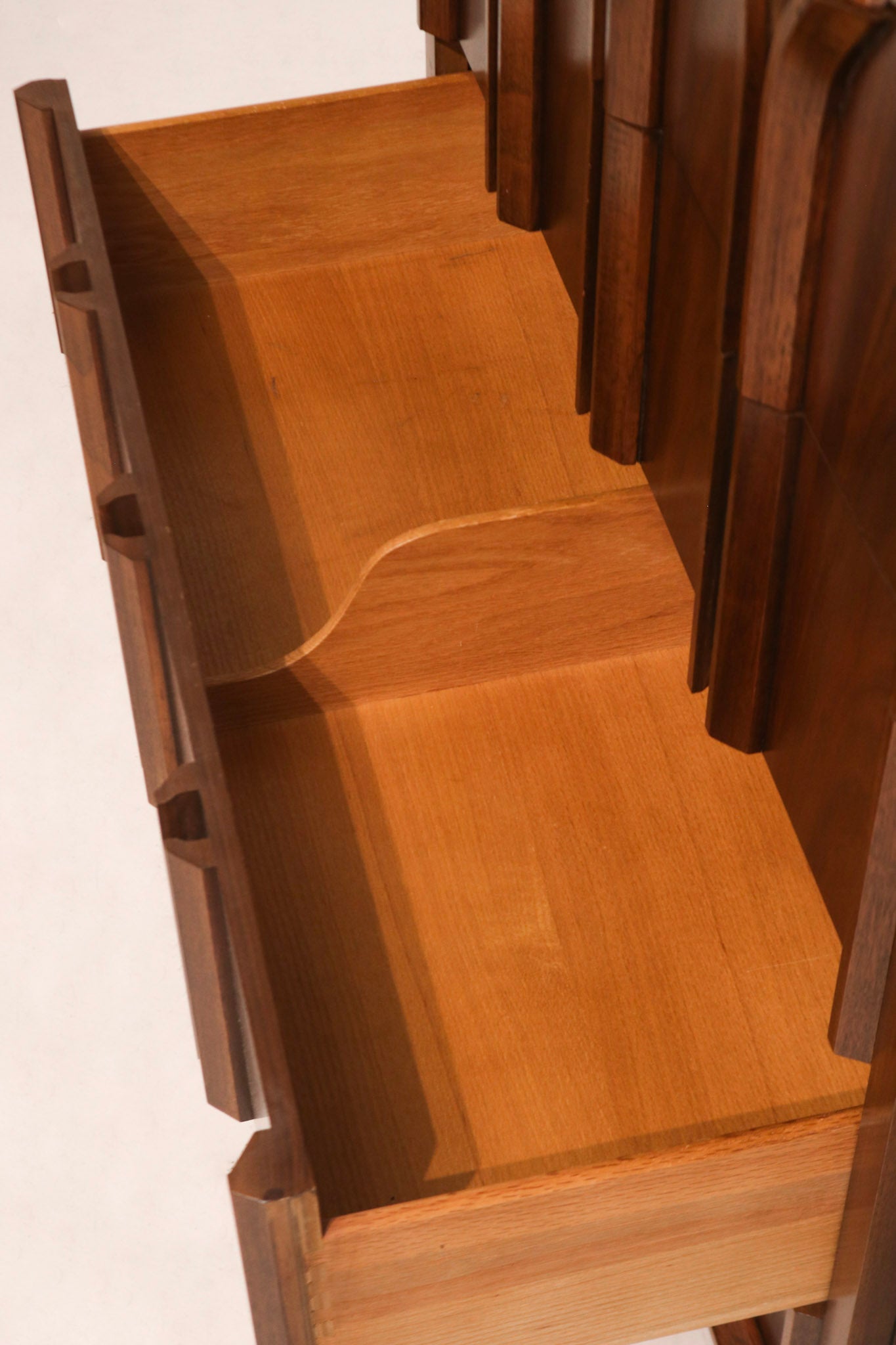 Detail of interior drawer construction with dovetail joints in solid walnut wood build
