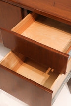 Profile view from left showing side panel design and leg shape in mid-century form