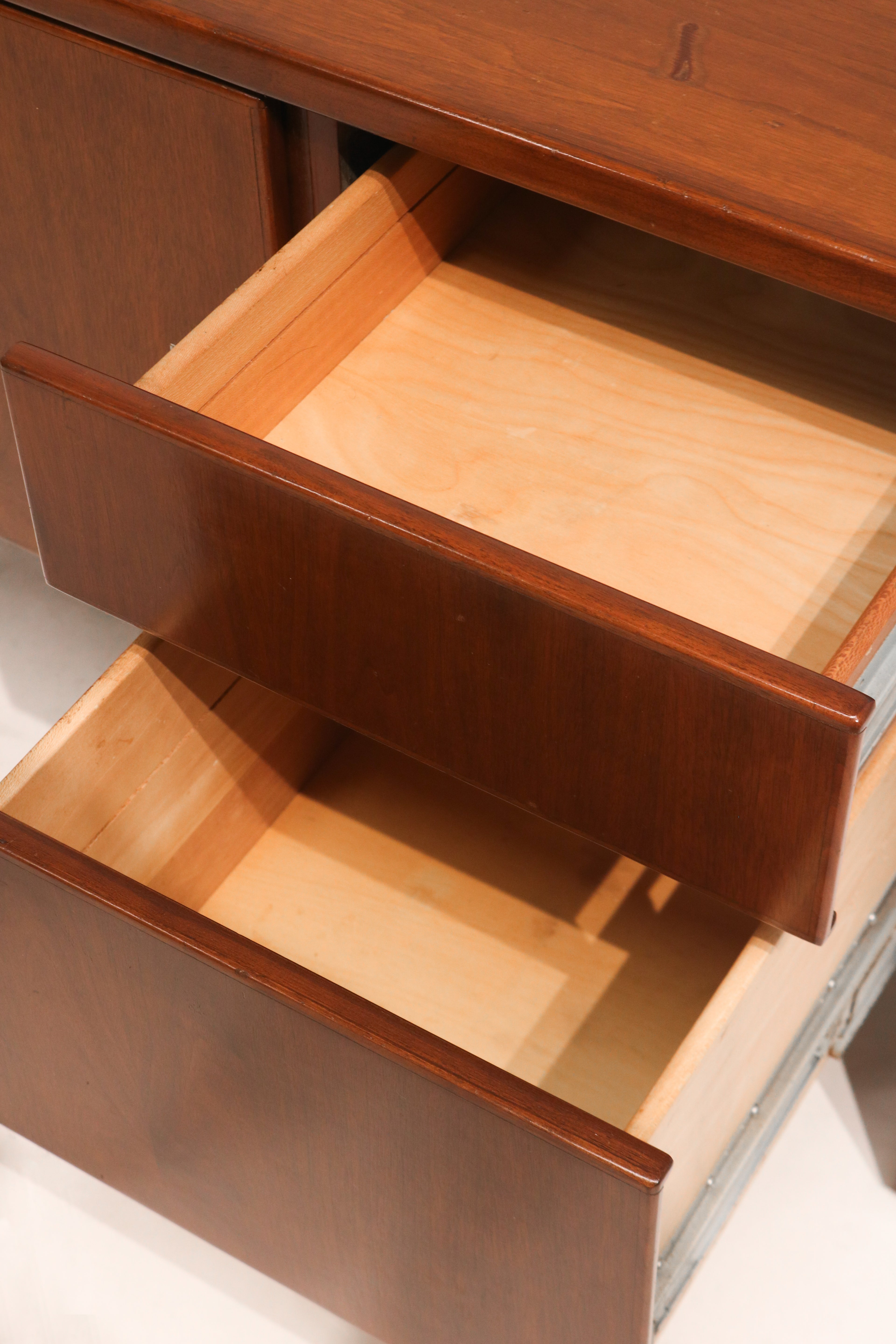 Profile view from left showing side panel design and leg shape in mid-century form