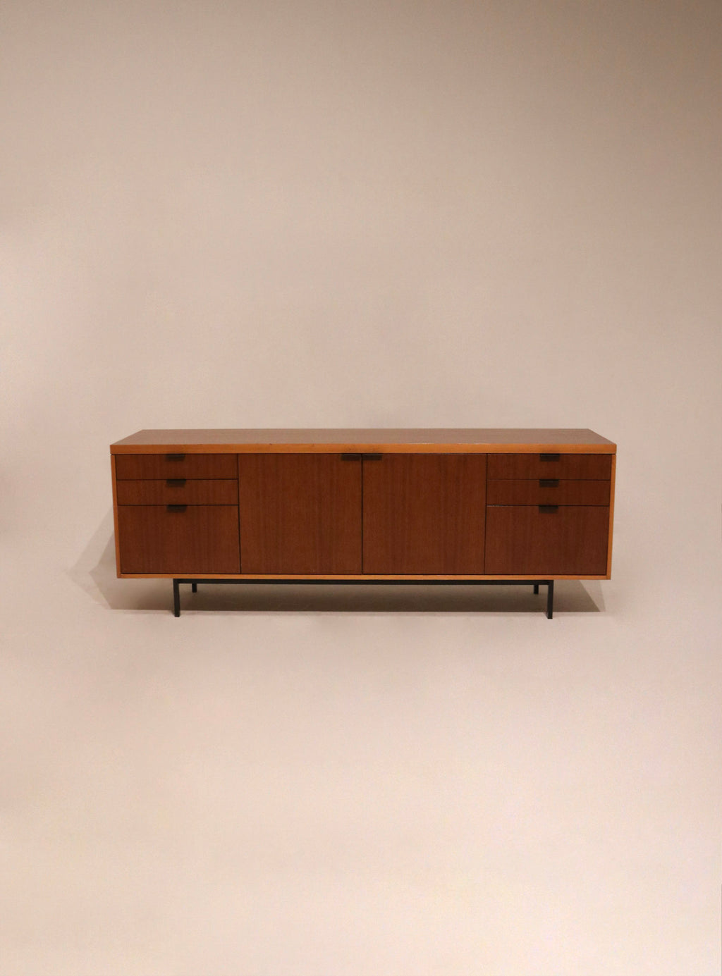 Full view of Mcm Mid Century walnut credenza sideboard with heavy metal base and rich wood finish