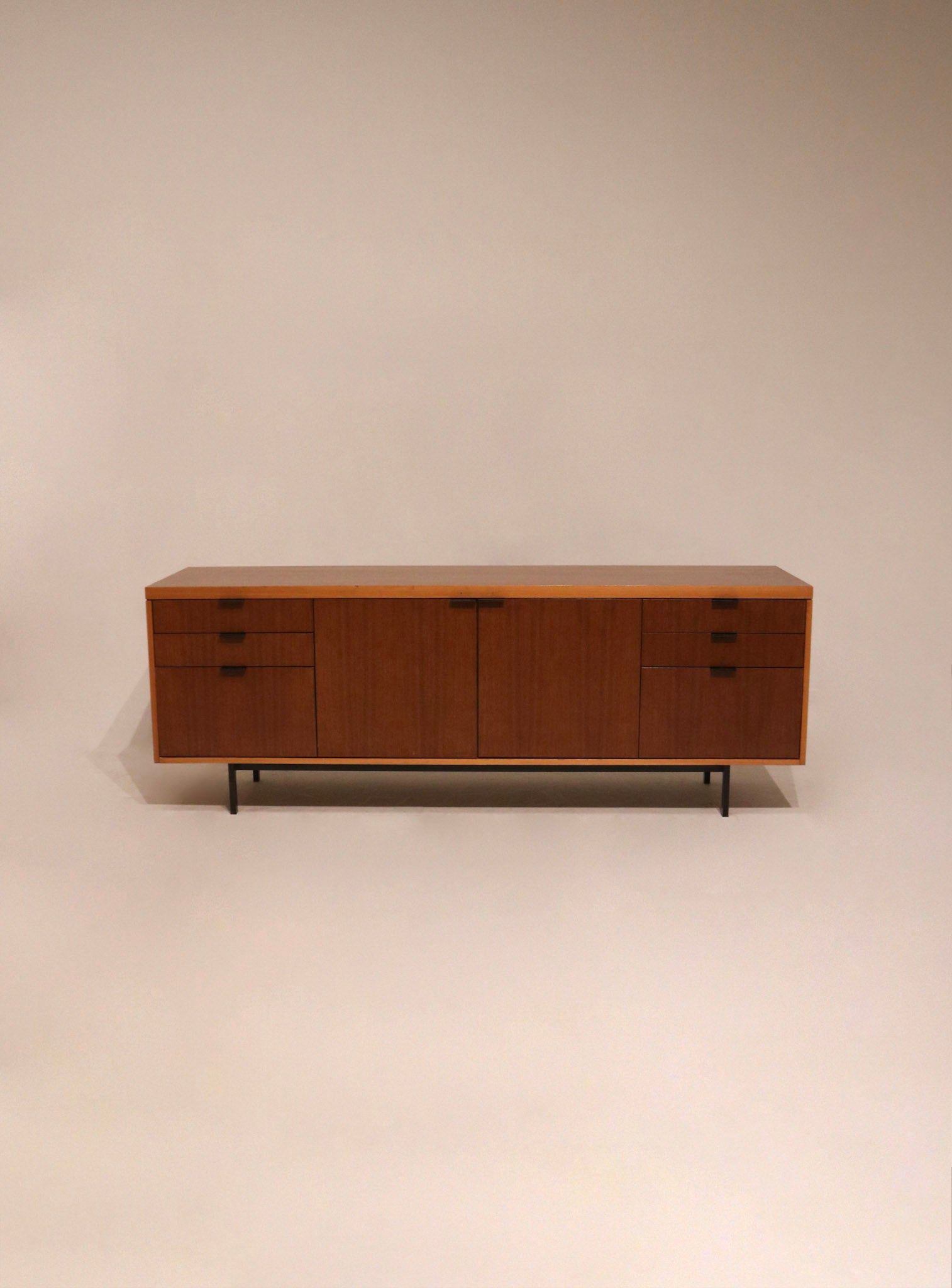 Full view of Mcm Mid Century walnut credenza sideboard with heavy metal base and rich wood finish