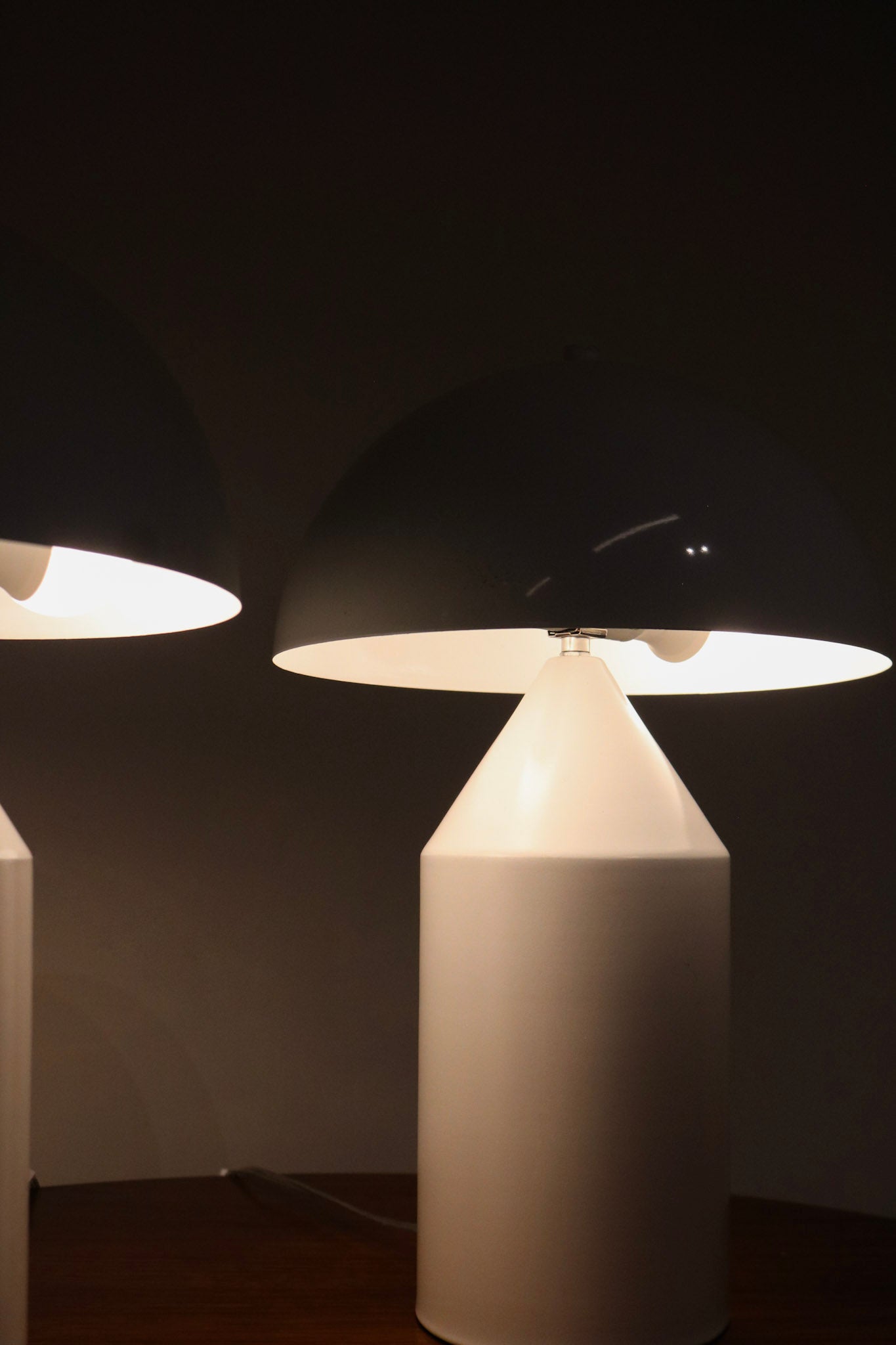 Detail image of minor unnoticeable marks on white metal surface of mushroom lamp