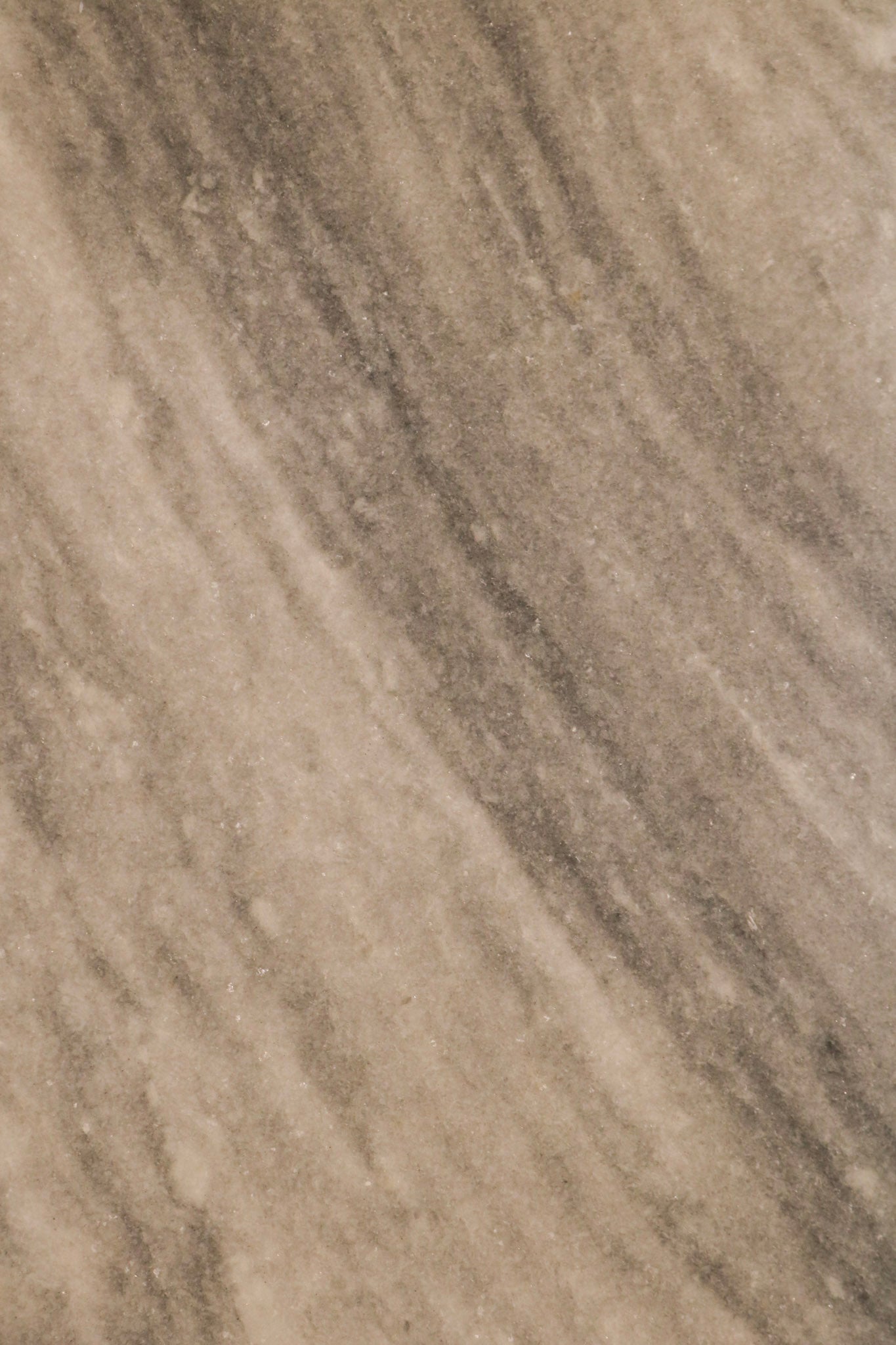 Side angle highlighting blocky, sturdy base and clean vintage lines of stone end table