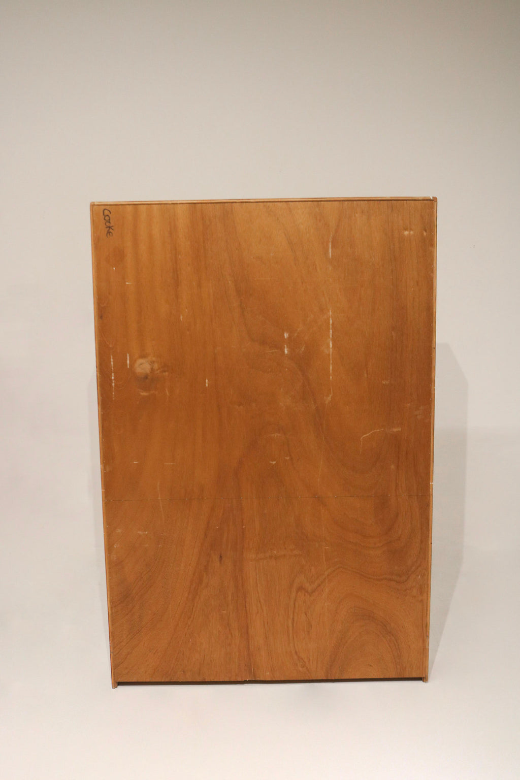 Interior view with adjustable shelves of vintage tall wood cabinet