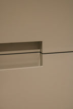 Detail of dresser’s drawer with pink marks inside illustrating interior condition