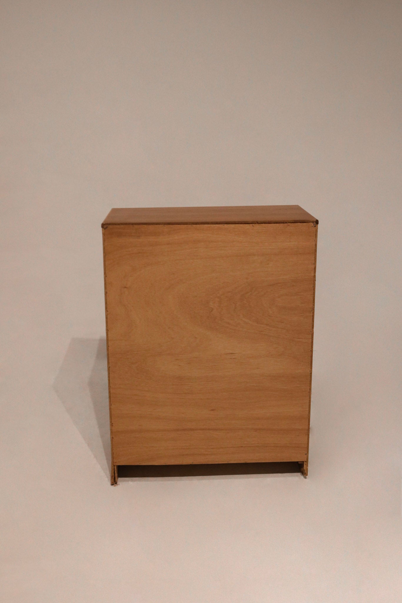 Back view showing minor peeling wood at bottom corner that doesn’t affect use