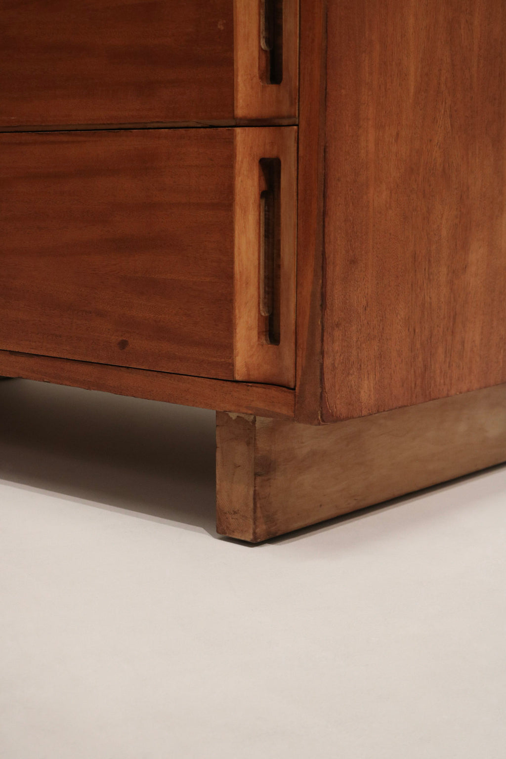 Close view of drawer edge and gap alignment on vintage solid wood dresser showing precise construction and smooth-operating drawers