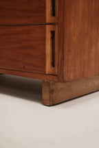 Close view of drawer edge and gap alignment on vintage solid wood dresser showing precise construction and smooth-operating drawers