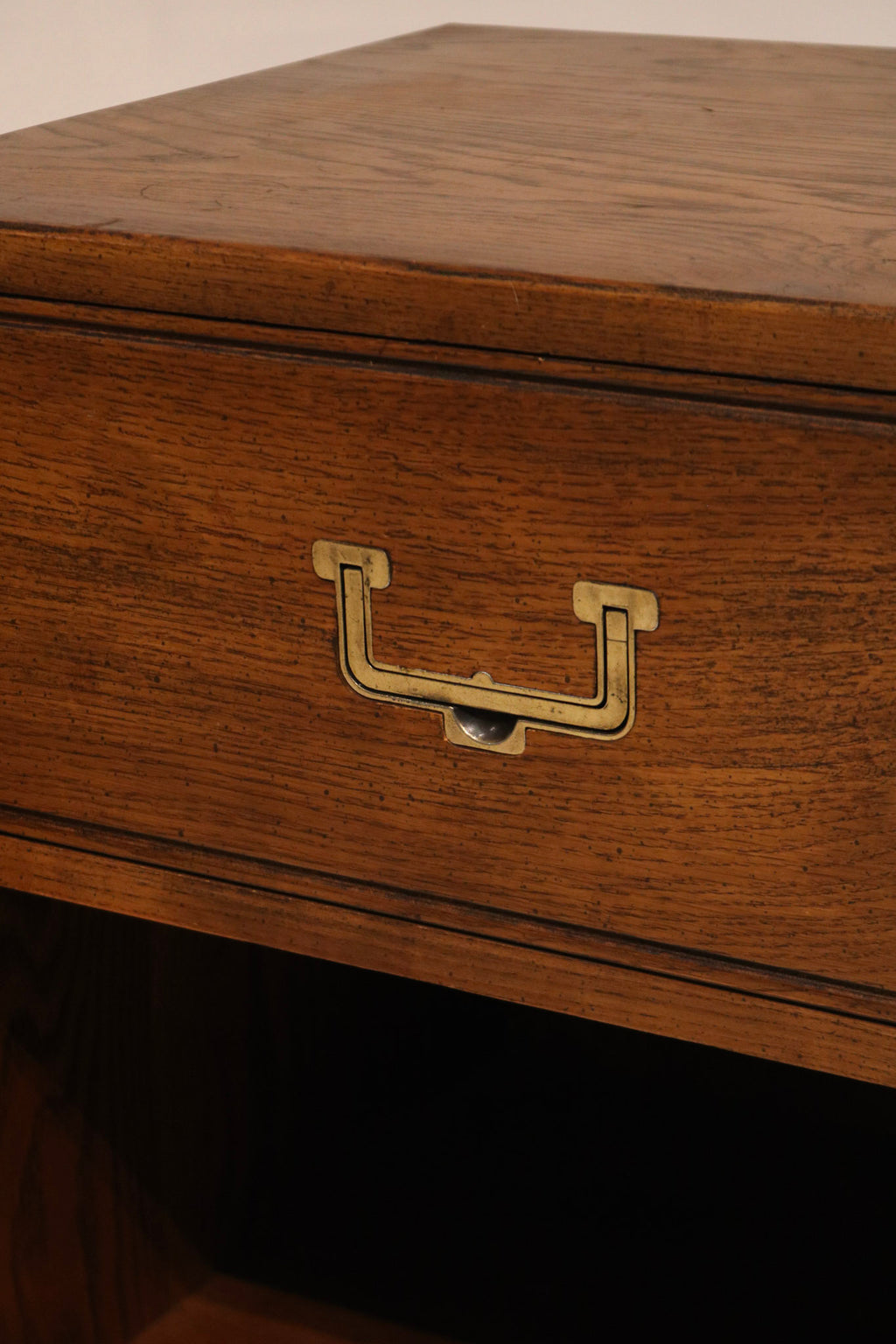 Top surface detail of the nightstand showing minor wear marks on one of the pair
