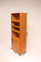 Dimensions of Mcm oak wood tall bookcase showing 32-inch width, 17-inch depth, and 84-inch height