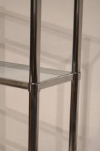 Top corner detail of the Vintage Mcm Chrome Bookcase highlighting sleek chrome finish