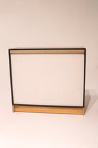 Open drawer view showing internal craftsmanship and natural wood finish