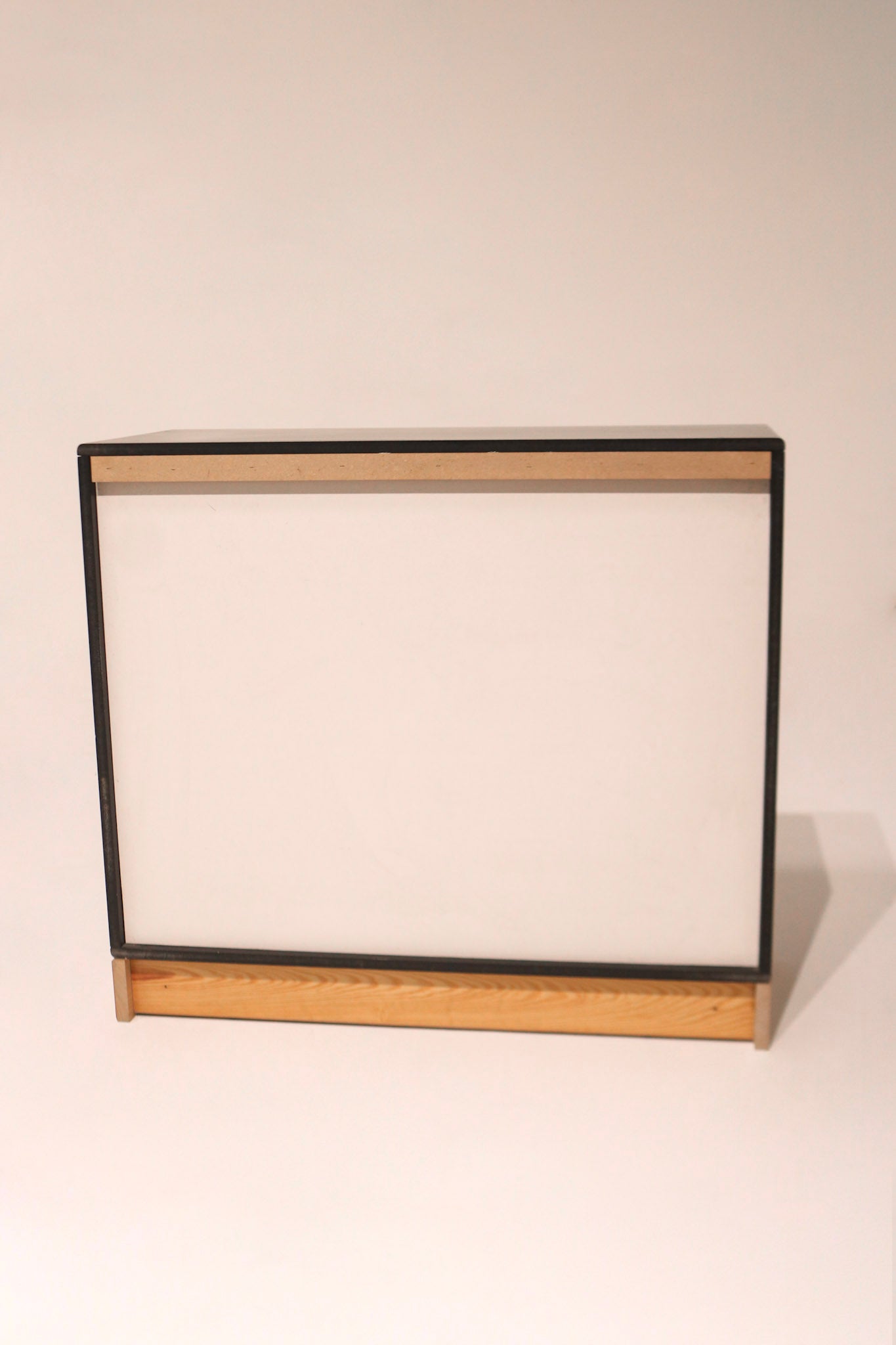 Open drawer view showing internal craftsmanship and natural wood finish