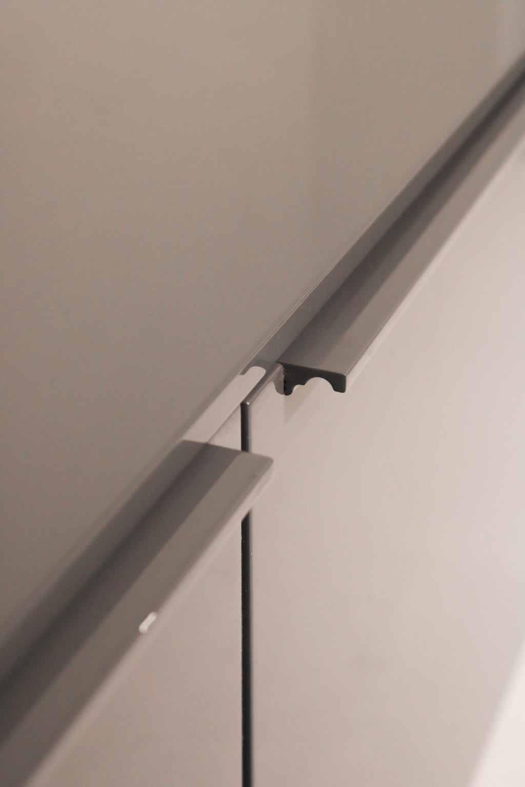 Detail of heavy metal base supporting the modern Capellini TV storage unit