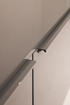 Detail of heavy metal base supporting the modern Capellini TV storage unit