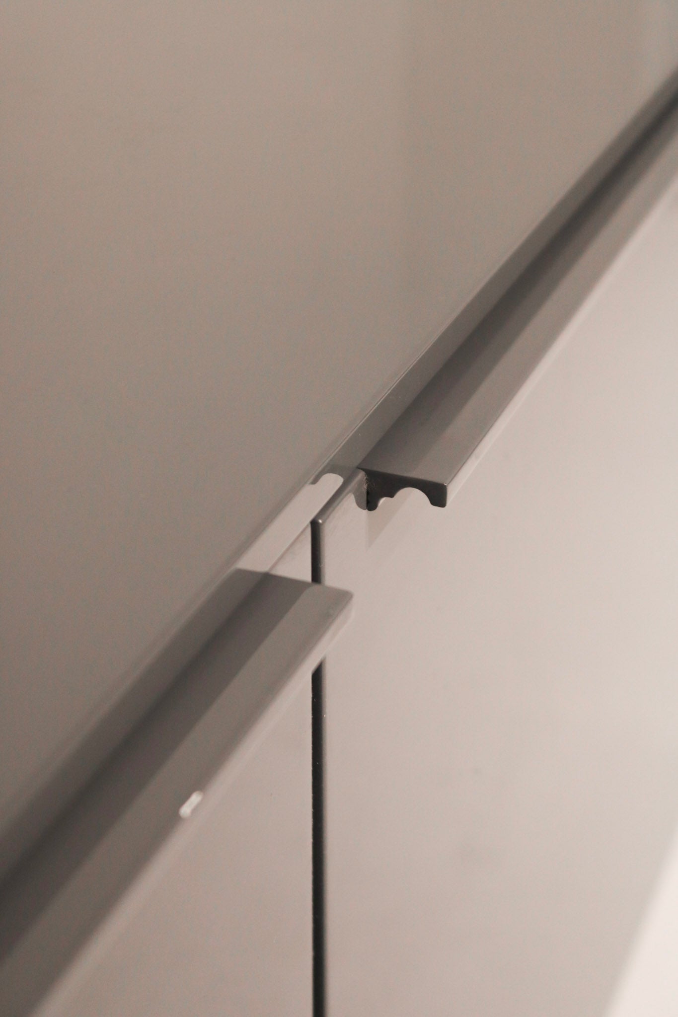 Detail of heavy metal base supporting the modern Capellini TV storage unit