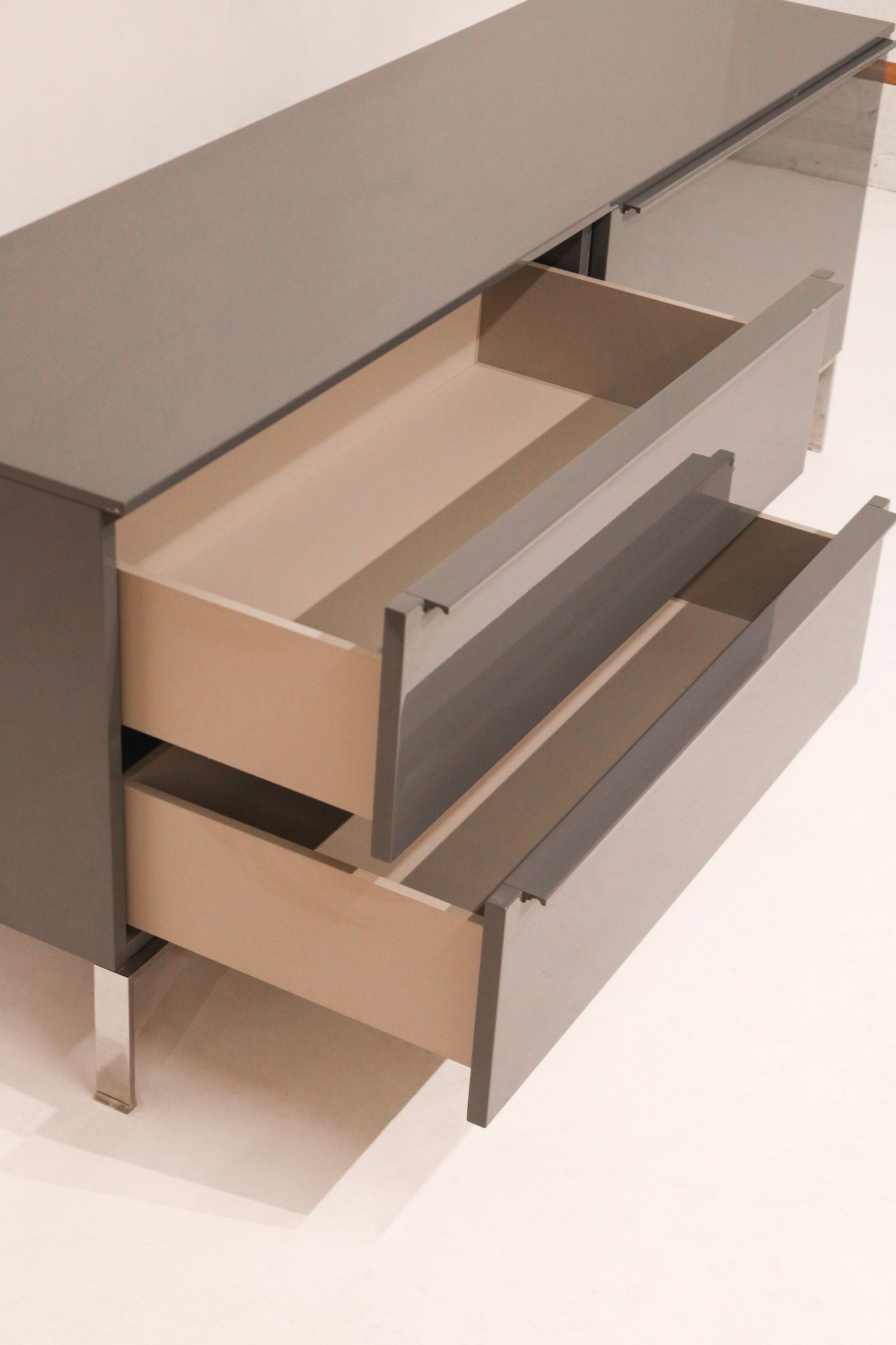 Side profile of Italian-designed TV cabinet showing straight sleek lines and modern edge