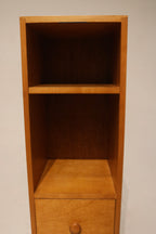 Back panel image of tall thin oak bookcase, shows overall vertical design