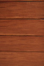 Detail photo of corner and leg junction on solid wood dresser chest, heavy sturdy support and sanded stained walnut finish visible