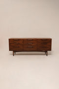 Main view of Mid Century Modern dresser with walnut wood finish and 9 drawers in full frame