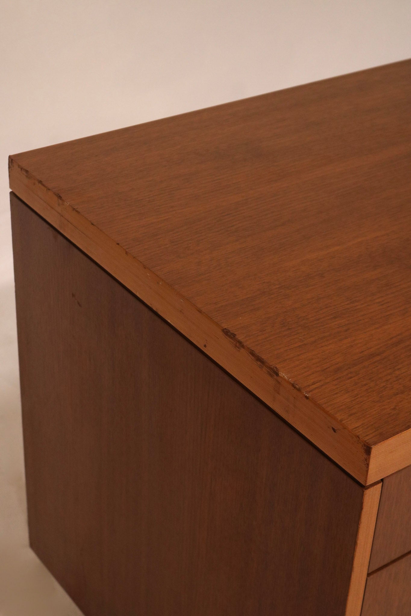 Detail of cabinet corner showing precise joinery and quality craftsmanship