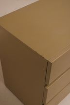 Close-up of bottom drawer glide showing smooth mechanics and vintage wood joints