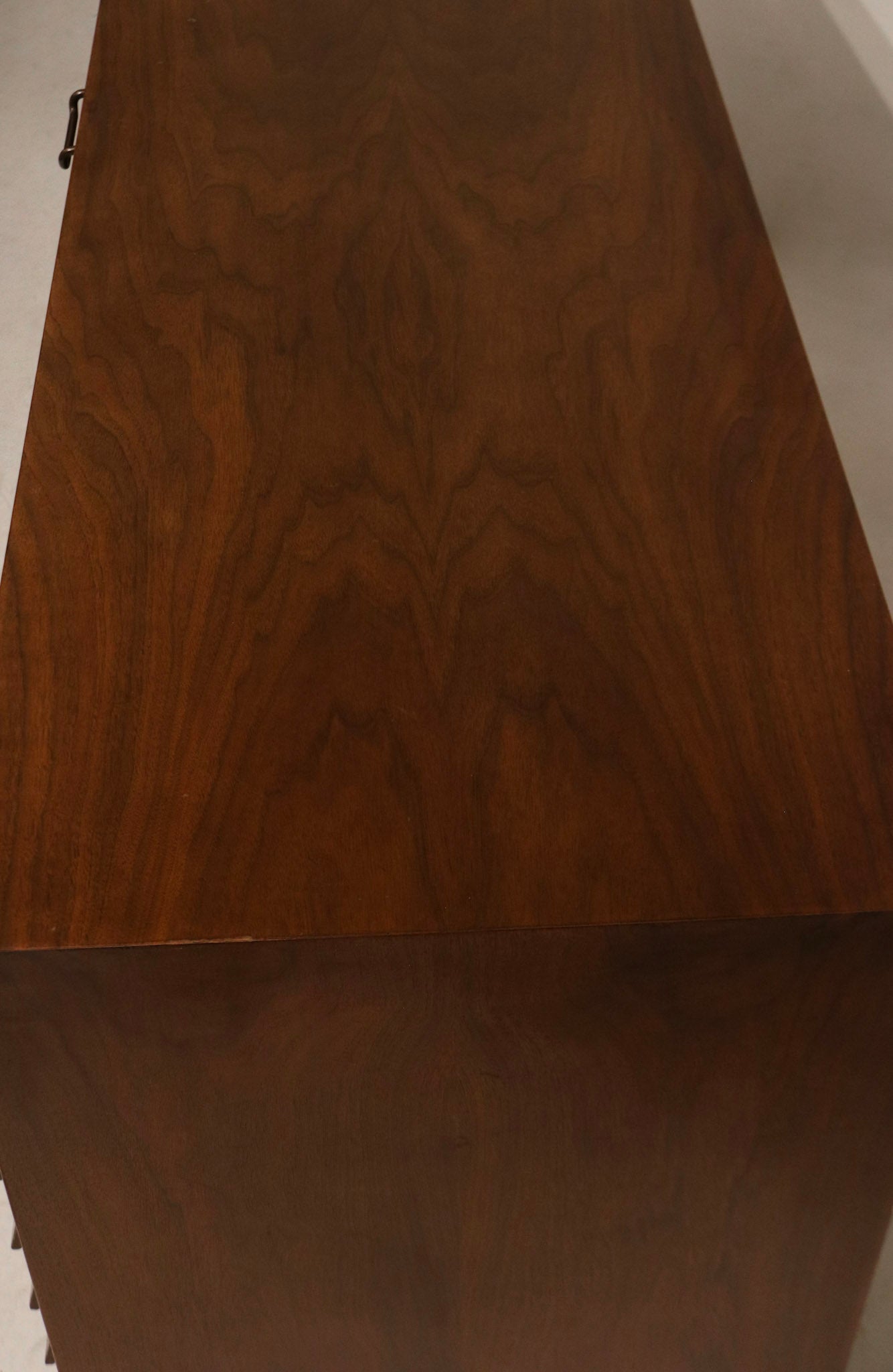 Corner and joint close-up revealing tight seams, solid wood edge construction and light age patina