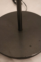 Shot of the lamp turned on, emitting soft ambient light through the translucent glass