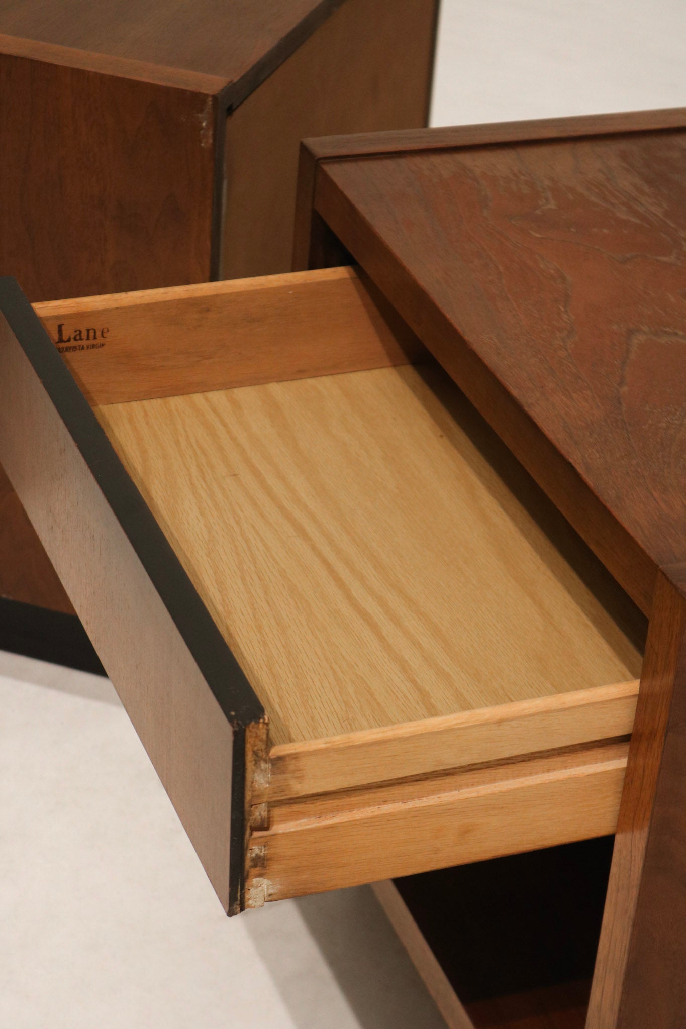Top grain pattern: close crop of walnut tabletop grain, color variation, tight grain detail and aged finish