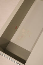 Top-down shot of dresser emphasizing depth and storage surface