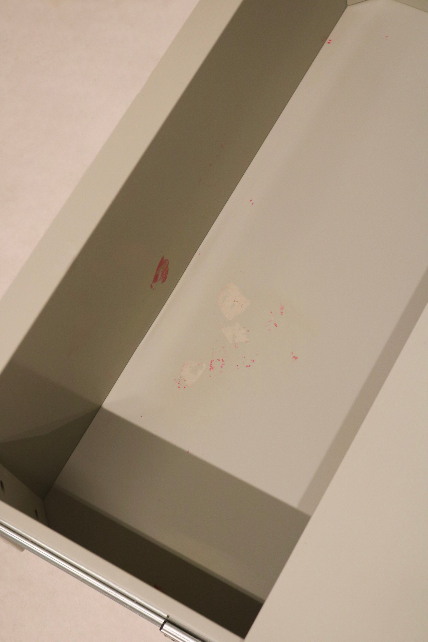 Top-down shot of dresser emphasizing depth and storage surface