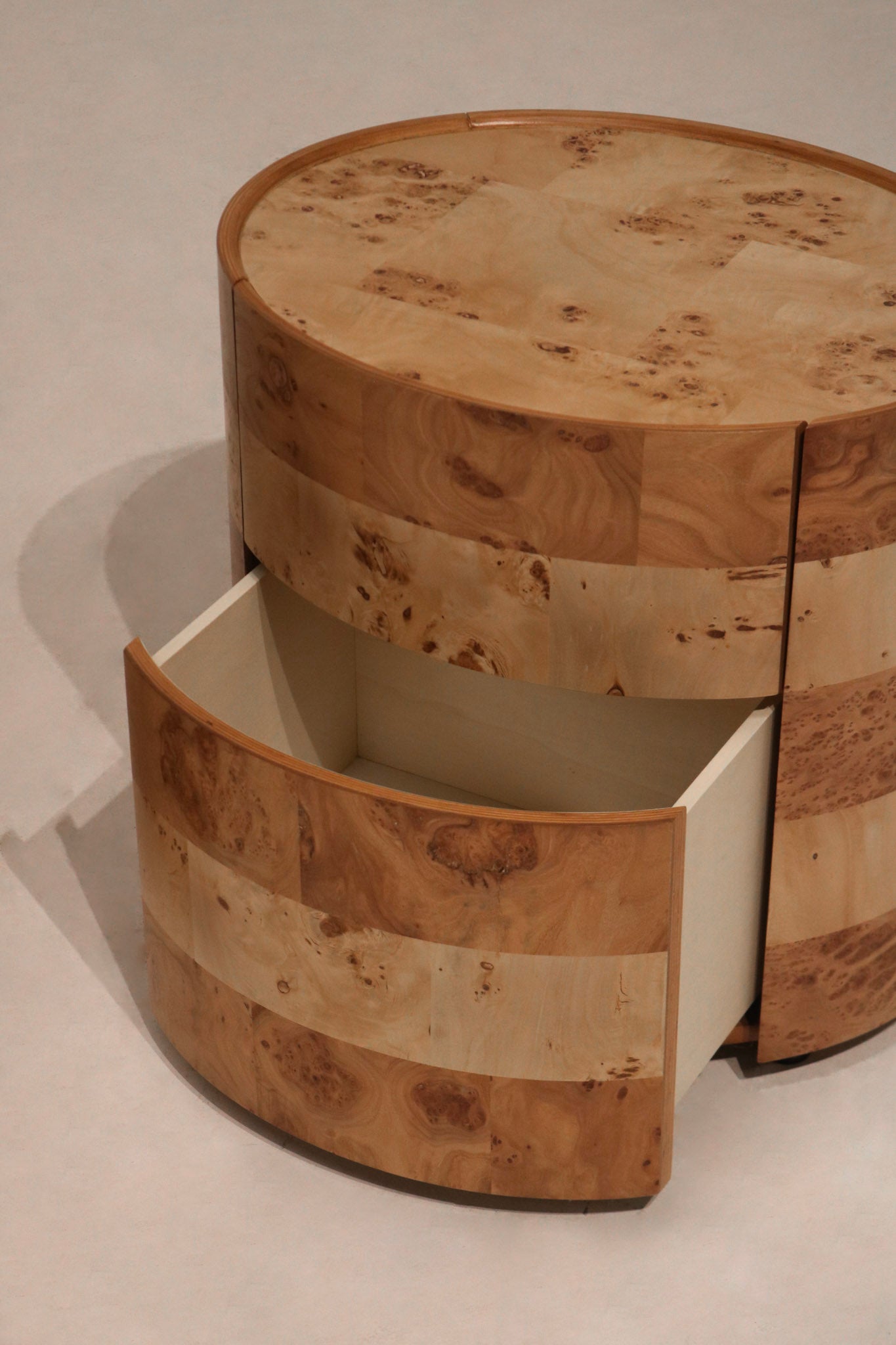 Back view of each nightstand showing clean craftsmanship and smooth veneer finishes