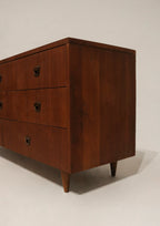 Close-up of drawer handles with original mid-century hardware intact