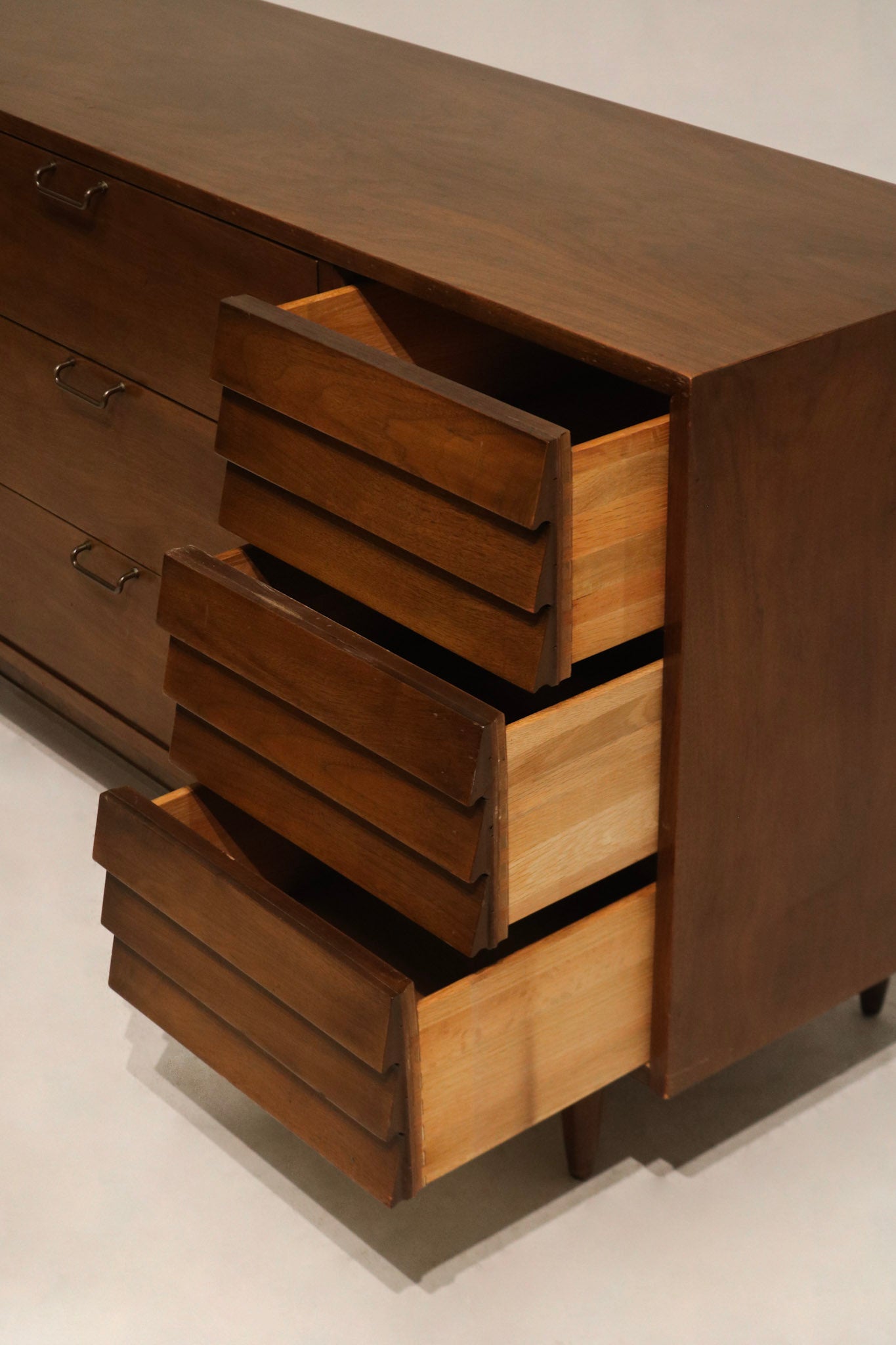 Lower back and leg attachment detail showing sturdy joinery, weighty construction and intact original structure