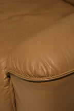 Detail of seat cushion seam highlighting stitching and leather quality