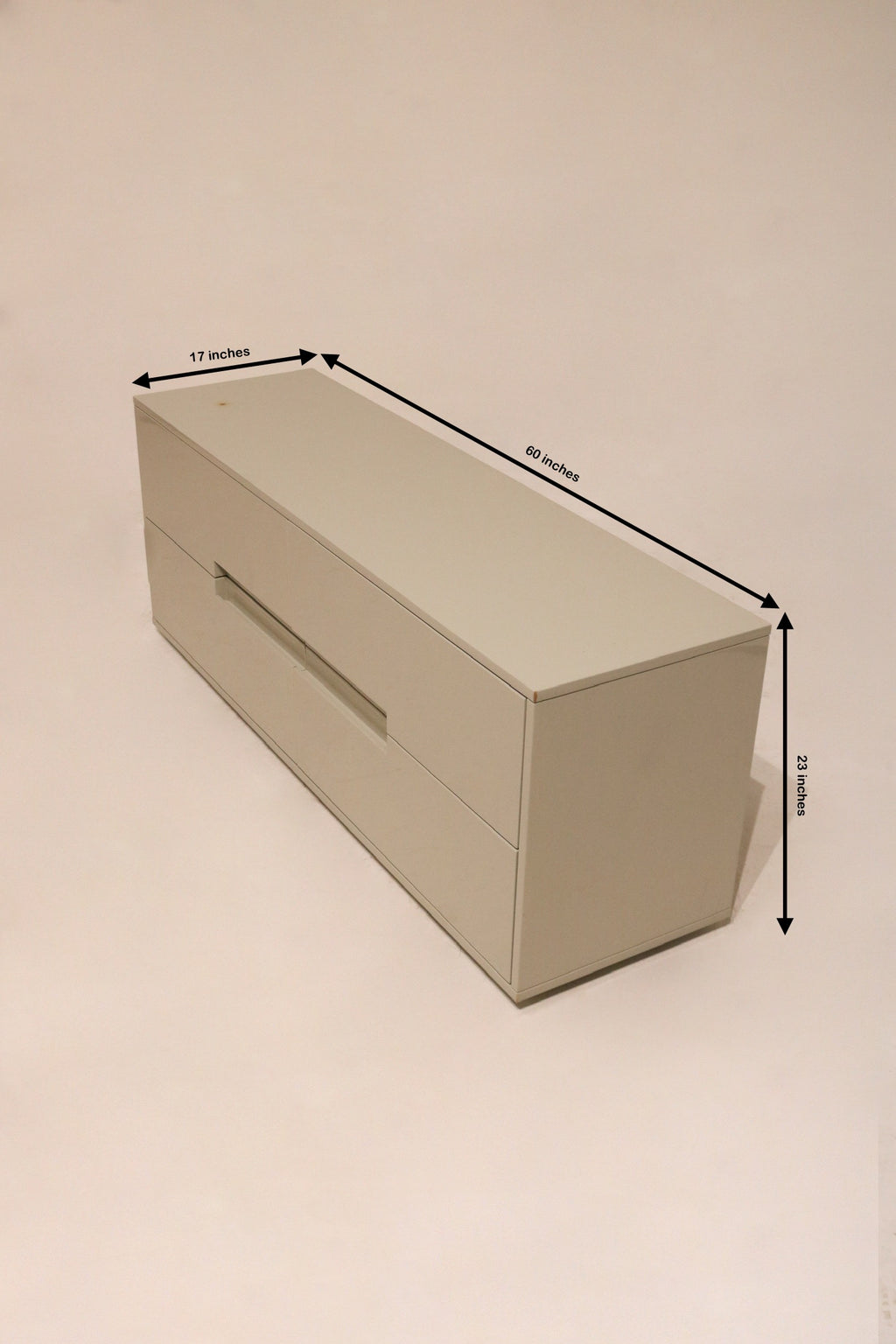 Size display of CB2 Low Dresser, showing measurements 60 inches wide, 17 deep, 23 high