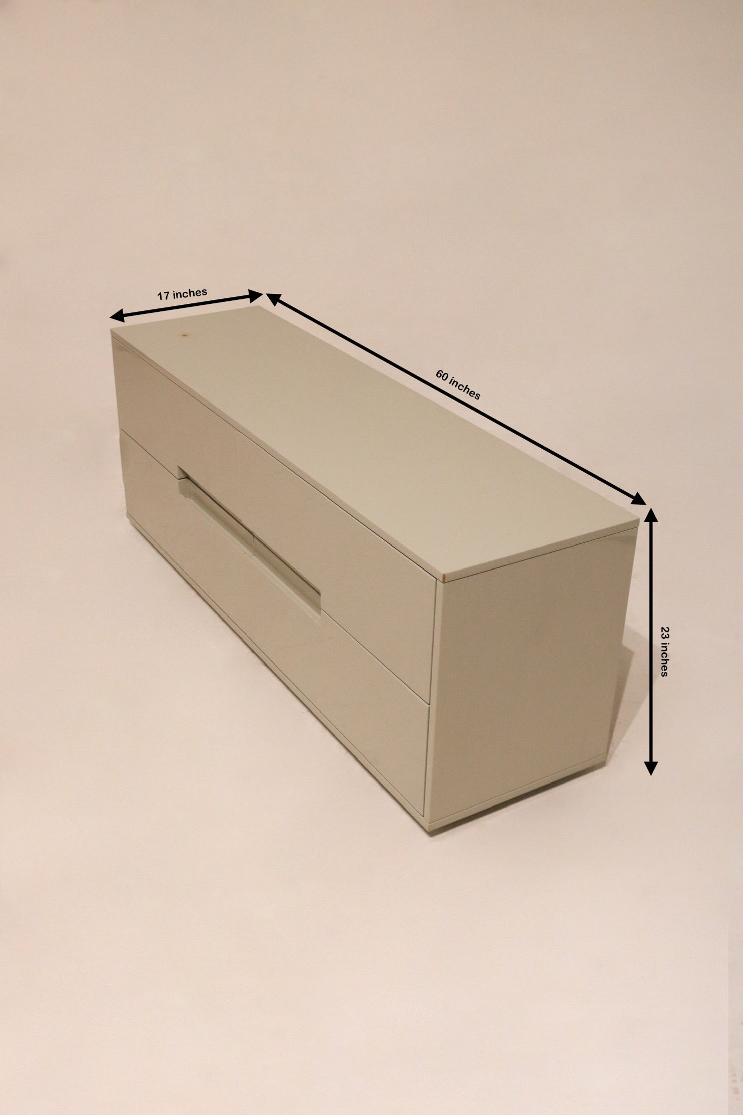 Size display of CB2 Low Dresser, showing measurements 60 inches wide, 17 deep, 23 high