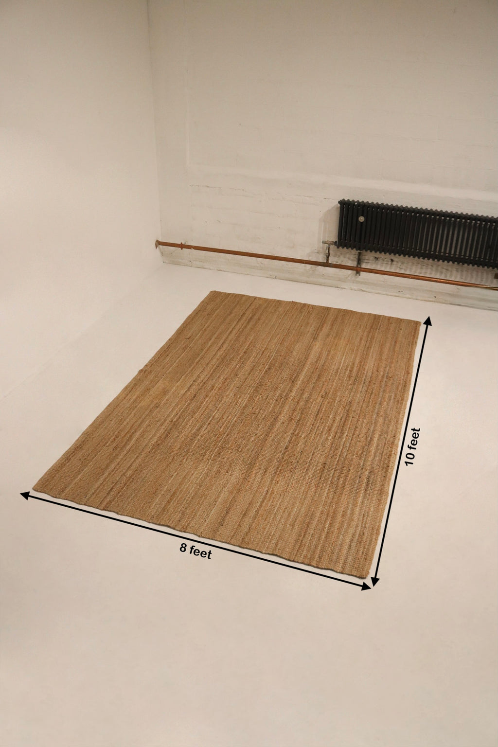 Size view showing detailed dimensions of the Jute Contemporary Boho Area Rug in a clean NYC apartment