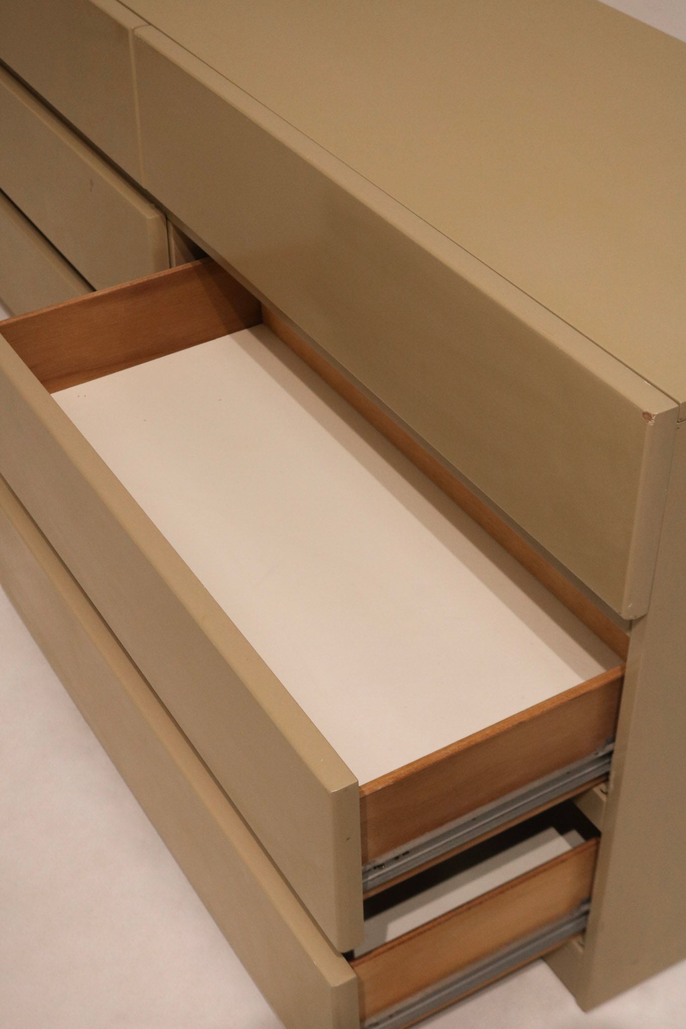 Rear panel of dresser showing solid wood back in excellent condition