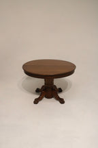 Antique oak table with extendable leaves