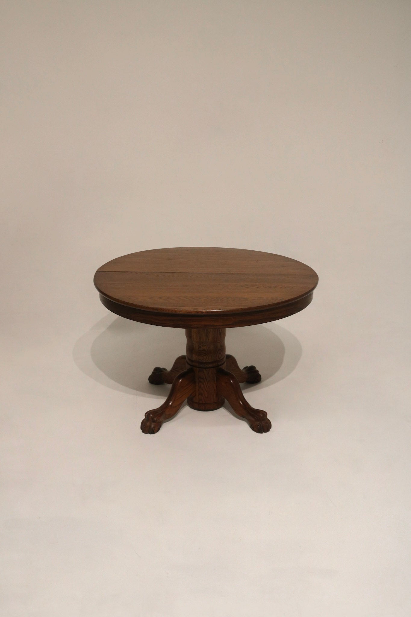 Antique oak table with extendable leaves