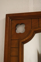Corner detail of the solid oak wood frame with mitered joint, visible glue lines, aged finish and original hardware.
