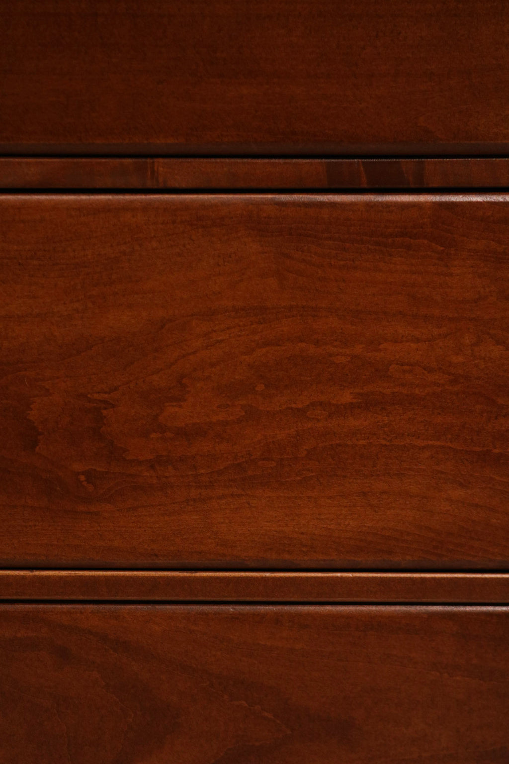 Focus on dovetail joinery inside drawer, demonstrating durable wood construction