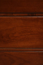 Focus on dovetail joinery inside drawer, demonstrating durable wood construction