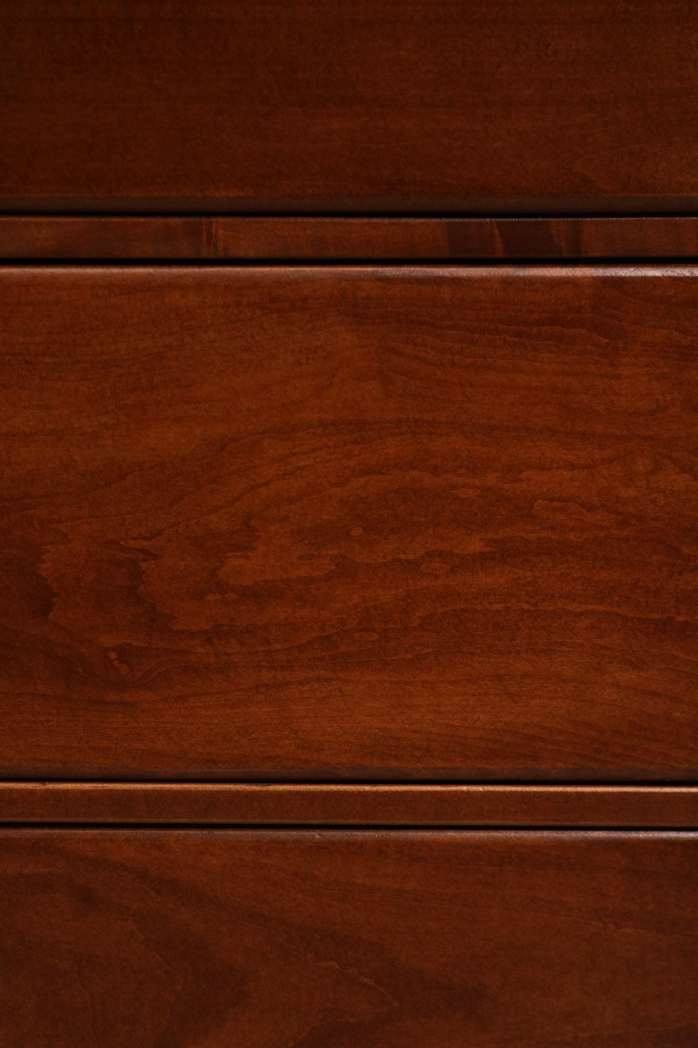 Focus on dovetail joinery inside drawer, demonstrating durable wood construction