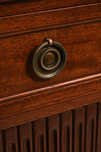 Bottom base of the dresser highlighting tapered legs and MCM design details
